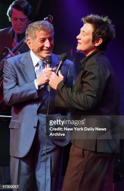 Singers Tony Bennett and k.d. Lang perform onstage during "A Night At The Apollo," a Democratic National Committee fundraiser at the Apollo Theater...
