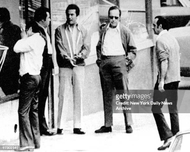 Three men in middle are Angelo Ruggiero, John Gotti and Carmine Fatico, outside the Bergin Hunt and Fish Club