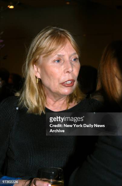 Singer-songwriter Joni Mitchell is on hand for Aperture's 50th Anniversary Golden Gala benefit at Sotheby's New York. Mitchell presented fellow...