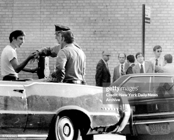 Chase Manhattan Bank, 450 Avenue P & East 3rd St. Brooklyn, Bank robber, John Wojtowicz comes out of bank to talk to cops.