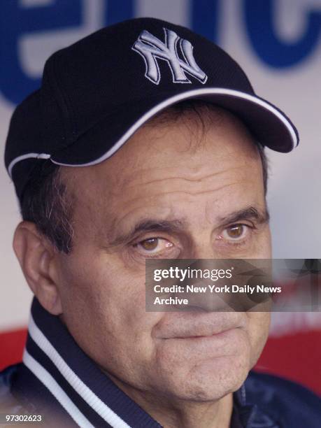 New York Yankees' manager Joe Torre surveys his team during batting practice before a game against the Boston Red Sox at Yankee Stadium in the Bronx.