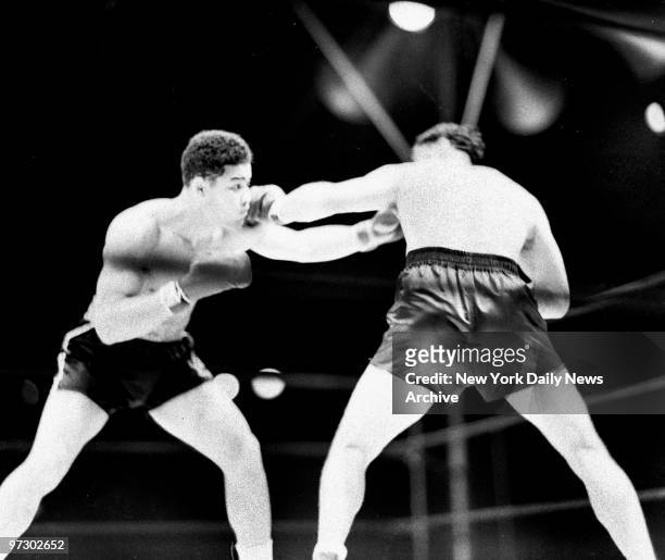 Joe Louis versus Max Schmeling II, A left by Max misses its mark and Joe counters with a light left. A moment later, however, his counters weren't so...