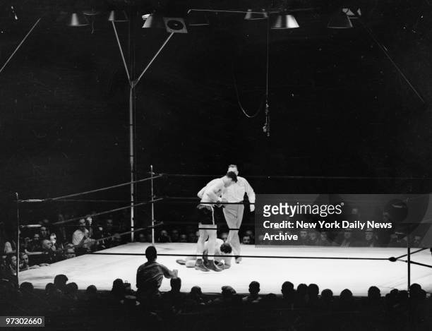 Joe Louis versus Max Schmeling II, Donovan directed Louis away from his punch-dizzing foe, who lies helpless and hopeless on the resin. Max was...