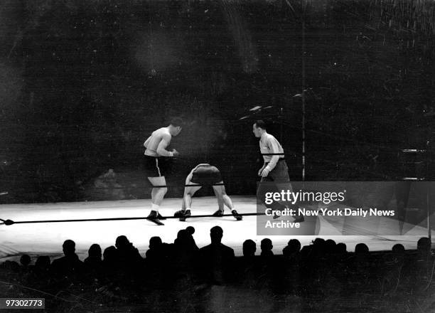 Joe Louis vs Max Schmeling., Both hands on the canvas, Max tries to get his bearings. No dice. He was back in his native Germany as far as last...