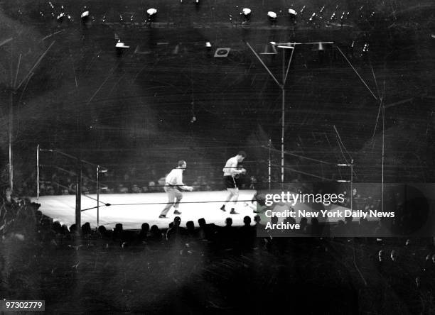 Joe Louis vs Max Schmeling., Both hands on the canvas, Max tries to get his bearings. No dice. He was back in his native Germany as far as last...