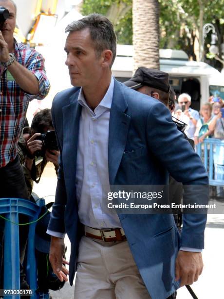 Inaki Urdangarin is seen arriving at Court to receive notification of his entry into prison after beeing sentenced to five years and 10 months in...