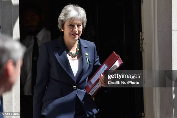 British Prime Minister Theresa May leaves Downing Street on June 13, 2018 in London, England. The Prime Minister will attend today the weekly Prime...