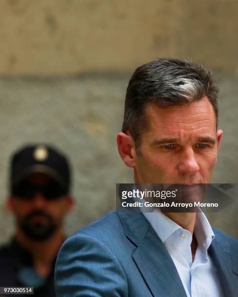 Former Olympic handball player and husband of Spain's Princess Cristina, Inaki Urdangarin leaves the courthouse on June 13, 2018 in Palma de...