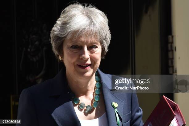 British Prime Minister Theresa May leaves Downing Street on June 13, 2018 in London, England. The Prime Minister will attend today the weekly Prime...