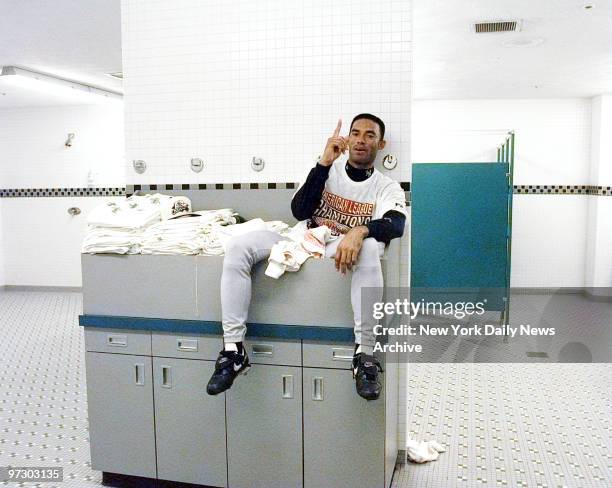 New York Yankees' Mariano Rivera celebrates after Yankees defeated the Baltimore Orioles, 6-4, to take the American League pennant.,