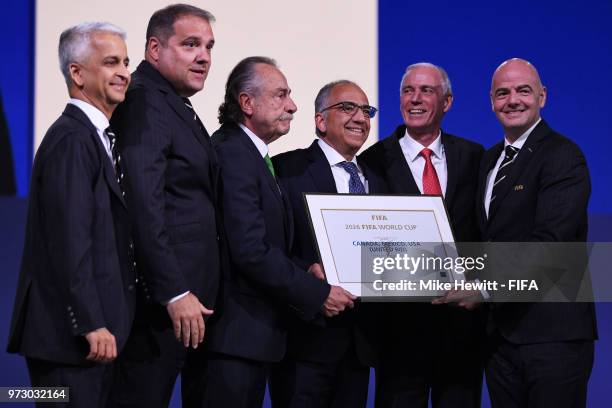 President Gianni Infantino poses with the United 2026 bid officials: Left-Right Sunil Gulati president of the United States Soccer Federation,...