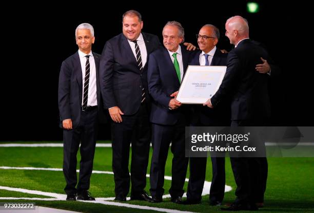 President Gianni Infantino poses with the United 2026 bid officials: Left-Right Sunil Gulati president of the United States Soccer Federation,...