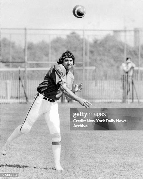 Joe Namath throws football during training on the field at Hofstra University in Hempstead, L.I.