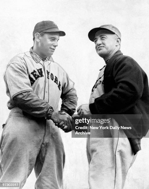 New York Giants' manager Bill Terry greets St. Louis Cardinals' manager Frank Frisch before an exhibition game at Flamingo Park in Miami Beach.