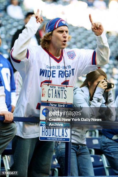 Joe Ruback of New City, N.Y., wears a string of vanity license plates showing his support for the New York Giants, and his disdain for the Dallas...