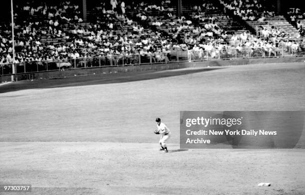 New York Yankees' Mickey Mantle playing shortstop in the ninth inning of game against the Cleveland Indians.