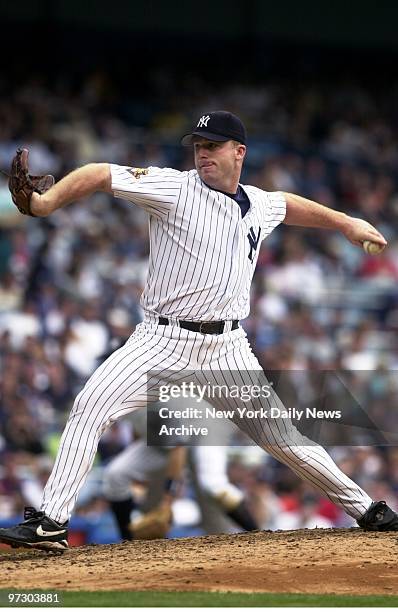 New York Yankees' Mike Stanton pitches in relief in the seventh inning as the Yanks top the Cleveland Indians, 9-4, at Yankee Stadium.