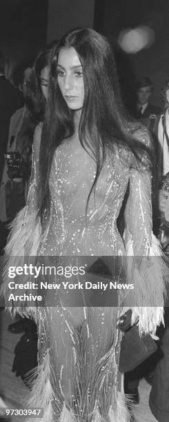 Cher wore one of the more spectacular costumes of the 70's by Bob Mackie: it had more feathers and flickers than fabric.