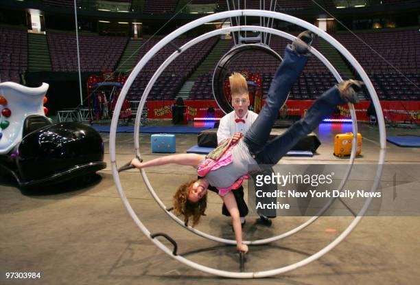 Daily News reporter Nicole Bode gets a lesson on the German Wheel from clown Bello Nock of Ringling Bros. And Barnum & Bailey Circus, currently...