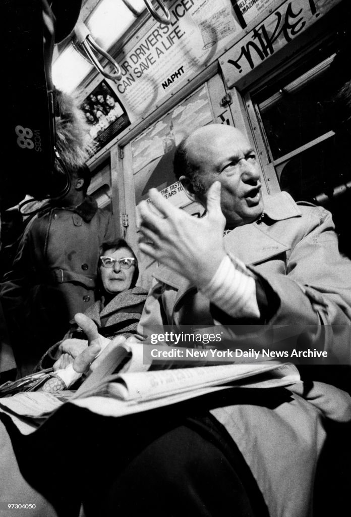 Mayor Ed Koch takes the Lexington Ave train to City Hall on
