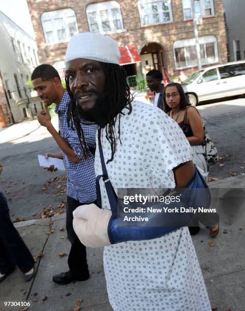 Garfield Dixon also called Major Mackerel, a reggae musician, arrives at his home at 158 East 91st Street in East Flatbush, after he was slashed by...