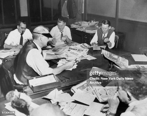 Daily News reporter William Murphy and staff at work on election eve.