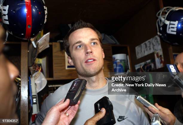 New York Giants' place kicker Lawrence Tynes speaks to media in the locker room at Giants Stadium where the team held a practice in preparation for...