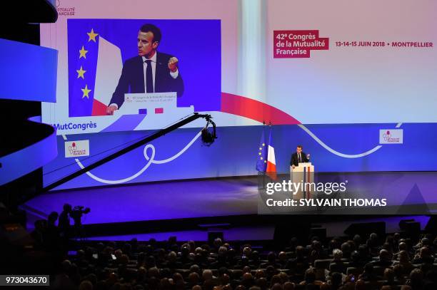 French President Emmanuel Macron gives a speech on social security policies during the '42nd Congres de la mutualite francaise' in the southern city...