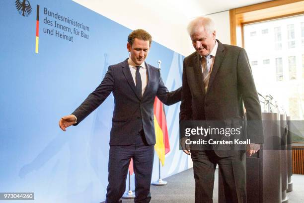 Austrian Chancellor Sebastian Kurz and German Interior Minister Horst Seehofer leave a finished press conference on June 13, 2018 in Berlin, Germany....