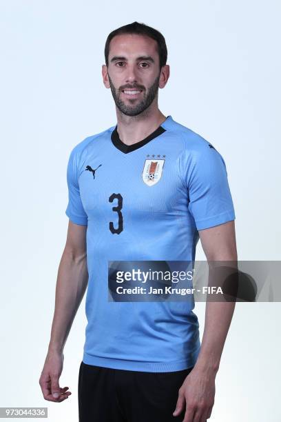 Diego Godin of Uruguay poses for a portrait during the official FIFA World Cup 2018 portrait session at Borsky Sport Centre on June 12, 2018 in...