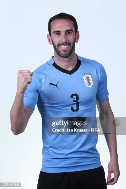 Diego Godin of Uruguay poses for a portrait during the official FIFA World Cup 2018 portrait session at Borsky Sport Centre on June 12, 2018 in...