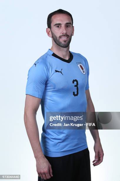 Diego Godin of Uruguay poses for a portrait during the official FIFA World Cup 2018 portrait session at Borsky Sport Centre on June 12, 2018 in...