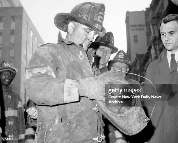 Smoke could be seen from the upper floors of buildings all over Manhattan from an inferno which took the lives of 12 city firemen. The men were...