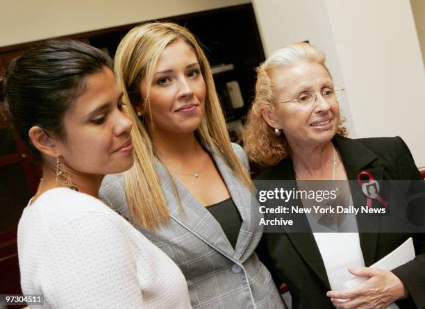 Johanna King Vespe , a classmate of slain graduate student Imette St. Guillen, stands with Imette's mother Maureen and sister Alejandra during a news...