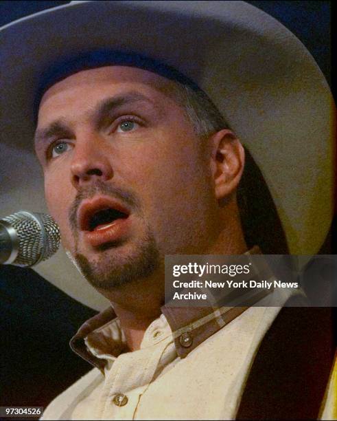 Garth Brooks playing a private concert for contest winners at K Mart on Broadway at Astor Place. He was promoting his new album "Sevens."