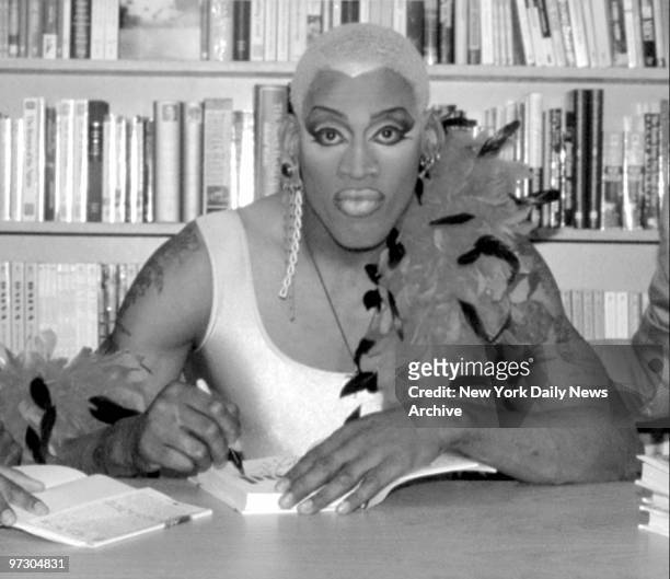 Chicago Bulls' Dennis Rodman is shown at a Chicago bookstore Saturday, May 4 during a book signing appearance for his new book "Bad As I Wanna Be."