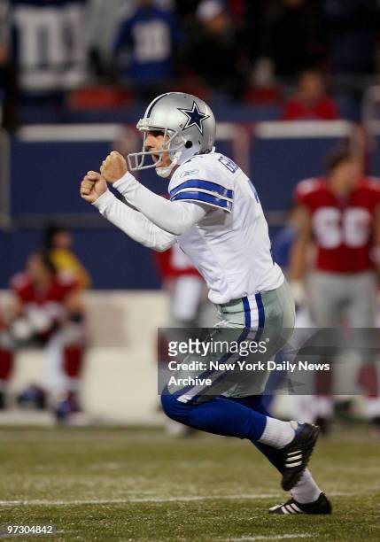 Dallas Cowboys kicker Martin Gramatica celebrates after splitting the uprights with a 49-yard, game-winning field goal with one second remaining...