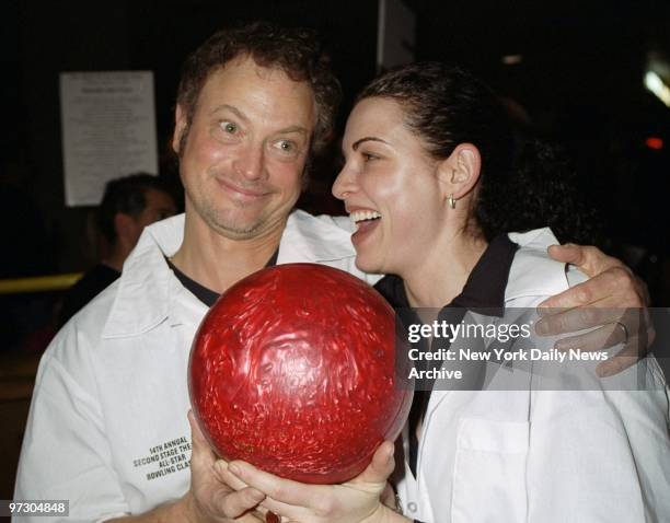 Gary Sinise and Julianna Margulies are ready to make their pitch at the Second Stage All-Star Bowling Classic at Leisure Time Recreation Bowling...