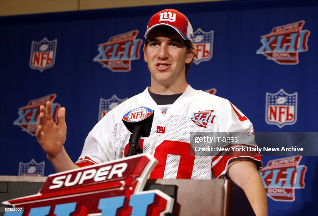 New York Giants' quarterback Eli Manning speaks to media dur