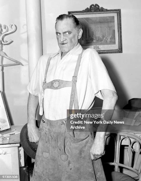 John Barrymore, wearing lederhosen, after sojouring in Mt. Sinai Hospital, strikes a pose to show he's fit as a fiddle at the Belasco Theater.