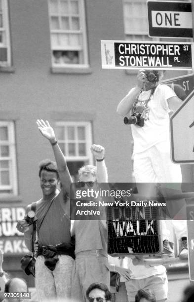 Gays at the Anniversary of the Stonewall Inn Riot., SIGNS OF A TIME far different from 1969, the year of the Stonewall Inn riot on Christopher St.,