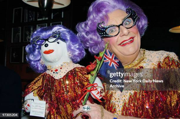 Dame Edna Everage holds up her bear for auction at B.B. King Blues Club & Grill for The Broadway Bears 8 benefiting Broadway Cares/Equity Fights AIDS.