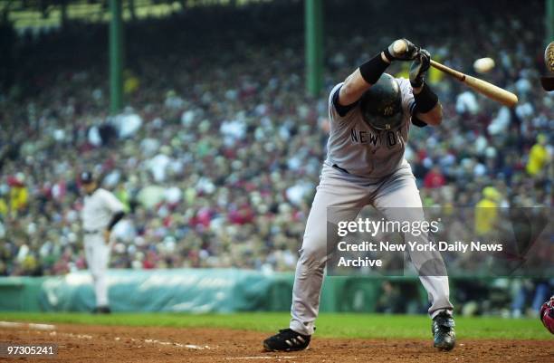 New York Yankees' outfielder Karim Garcia is hit in the upper back by a pitch from Boston Red Sox' Pedro Martinez in the top of the fourth inning of...