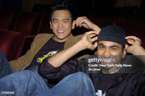 John Cho and Kal Penn are on hand at Planet Hollywood, where they served White Castle hamburgers to passersby outside the restaurant. They were there...