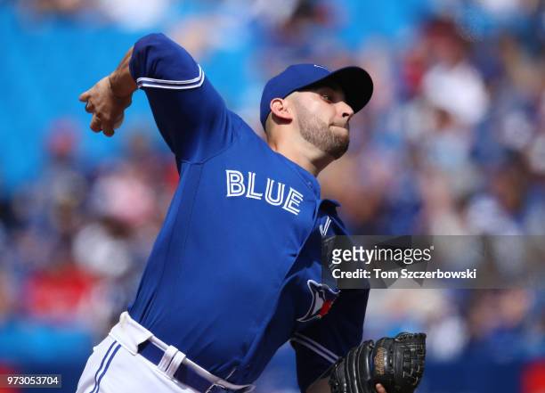 Marco Estrada of the Toronto Blue Jays delivers a pitch in the seventh inning during MLB game action against the Baltimore Orioles at Rogers Centre...