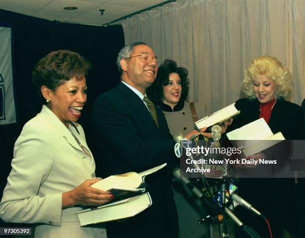 Gen. Colin Powell autographs his book, "My American Journey," in Woodbury, L.I., fror Lee Rameau, Diane LaDuca and Shelly Membano. Powell spoke at...