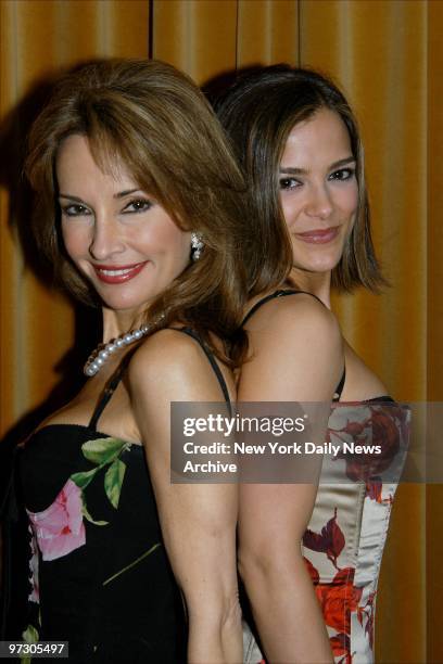 Soap stars Susan Lucci and Rebecca Budig stand back-to-back at the Marriott Marquis hotel, where Lucci was honored for her dedication to children's...