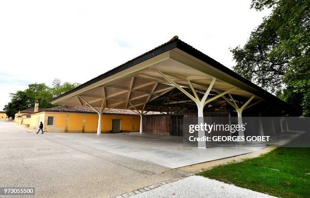 This photo taken on June 11, 2018 shows the outside of the Chateau Margaux' wine cellar by Norman Foster in Margaux, near Bordeaux, western France. -...