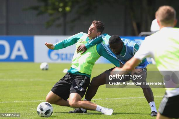 Mario Gomez battles for the ball with Antonio Ruediger during the Germany training session ahead of the 2018 FIFA World Cup at CSKA Sports Base on...