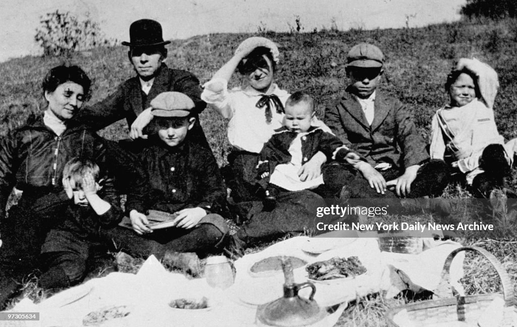 John Dillinger at 10 years old and his family on picnic.